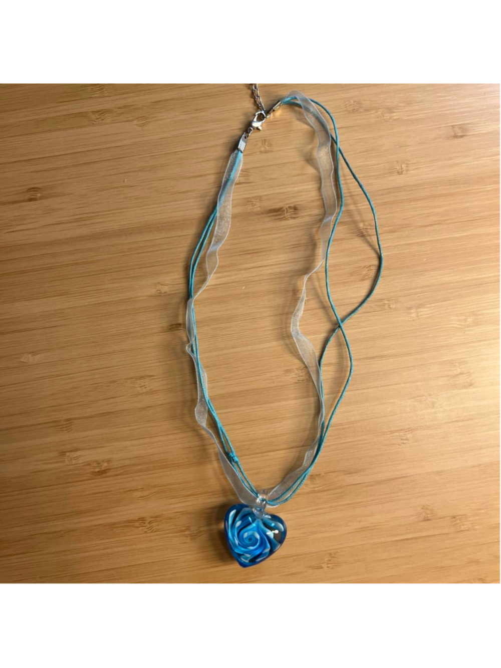 Laila Rowe blue y2k necklace with heart pendant